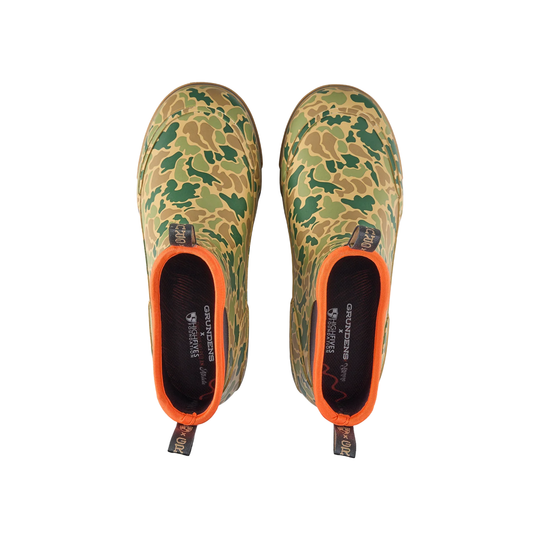 Camouflage ankle rain boots with orange trim, black insoles, and pull tabs