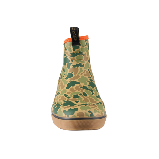 Camouflage ankle boot with orange trim, black pull tab, and tan textured sole