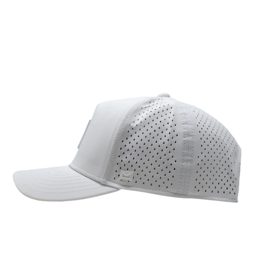 White baseball cap with perforated design on a white background