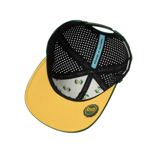 Yellow and black cap with a patterned interior on a white background