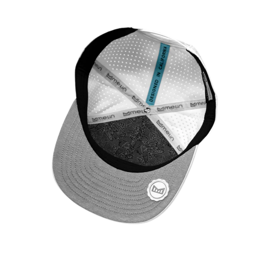 Gray cap with black brim and visible branding on a white background