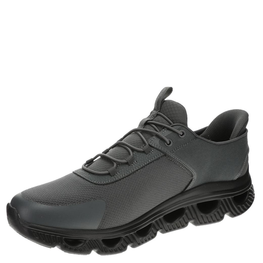 Gray athletic shoe with a white background