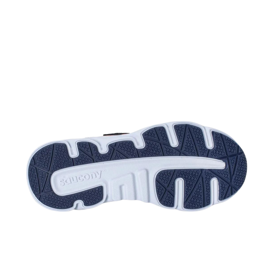 Close-up of a running shoe sole with 'On' branding on a white background