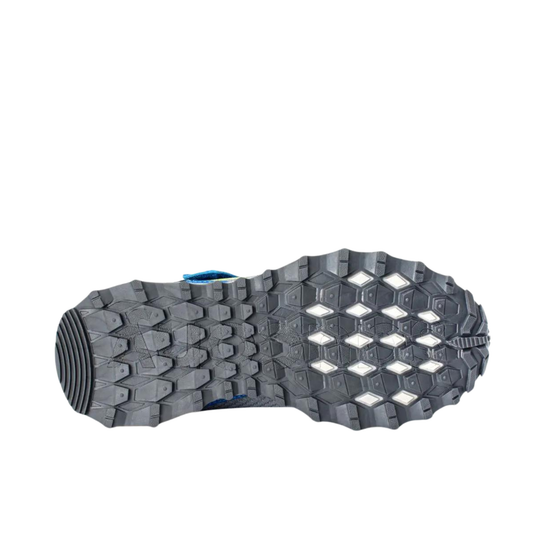 Close-up of a shoe sole with unique tread pattern on a white background