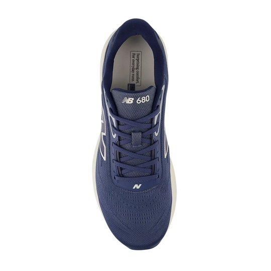 Blue athletic shoe with New Balance logo on a white background