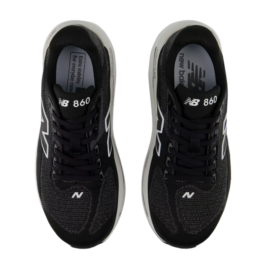 Black running shoes with white accents on a white background