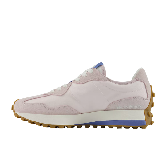 Pink sneaker with a white sole on a white background