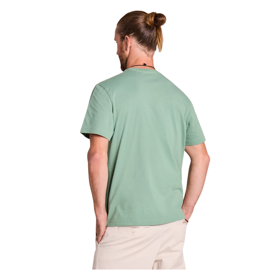 Person wearing a green t-shirt on a white background