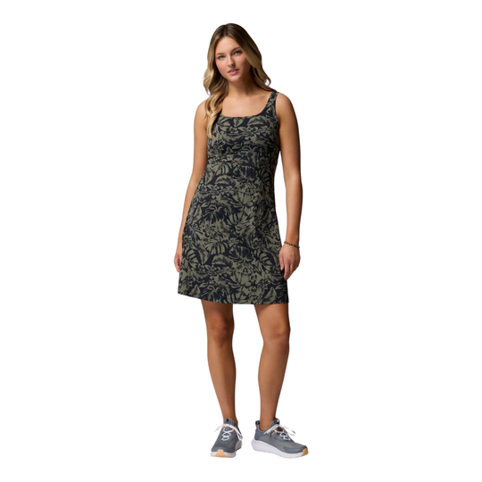 Green floral dress on female model on white background