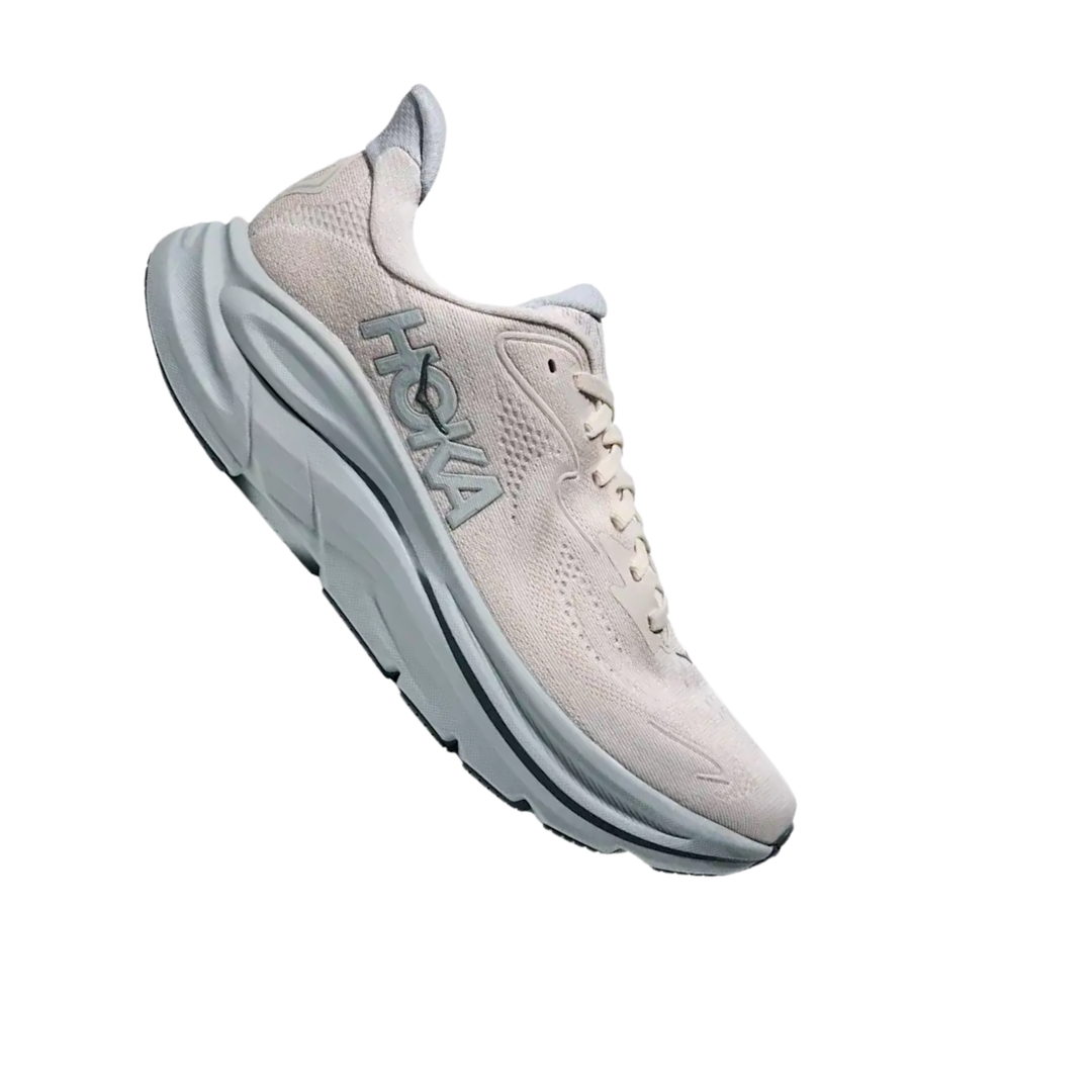 Grey and blue HOKA shoe on white background
