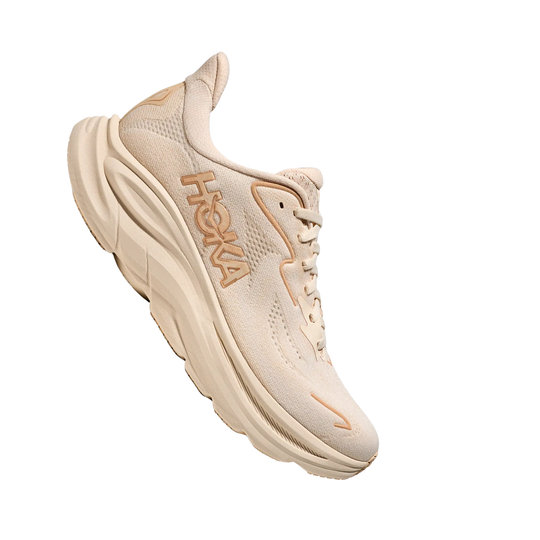 birch and beige HOKA shoe on white background 