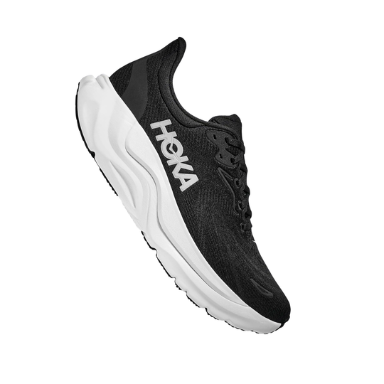 Black running shoe with white sole on a white background