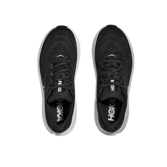 Black running shoes with white sole on a white background