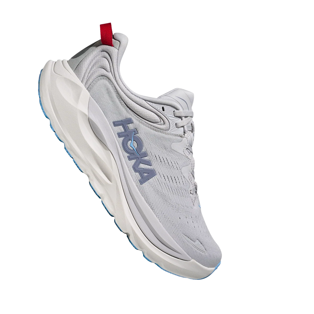 grey running shoe with blue sole and Hoka branding on a white background