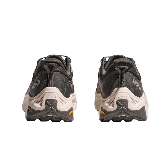 back heels of grey and black HOKA shoes