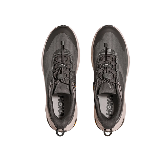 top view of grey and black HOKA shoes