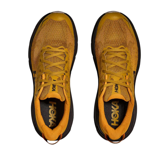 top view of yellow hoka shoes