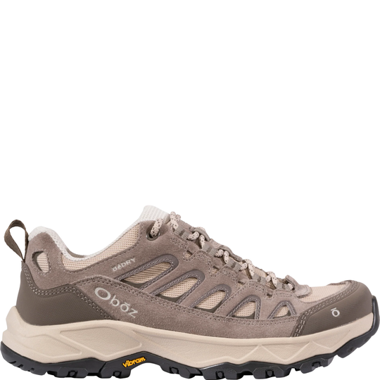 Low taupe-and-beige hiking shoe with suede overlays, mesh panels, laces, and a black lug sole
