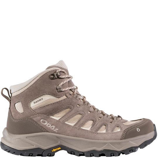 Taupe mid-top hiking boot with suede panels, mesh cutouts, and Vibram outsole
