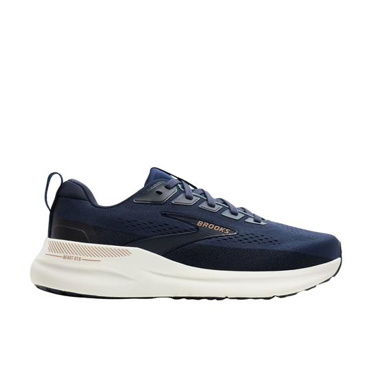 Navy running shoe with white sole on a white background