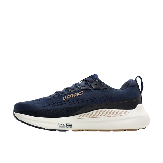 navy athletic shoe with white sole on a white background