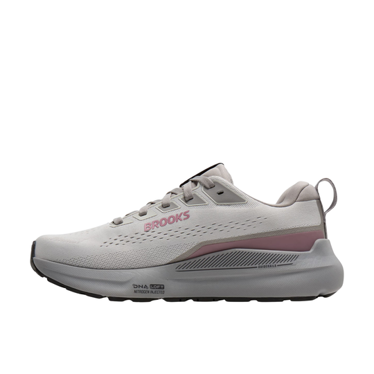 Grey running shoe with pink accents on a white background