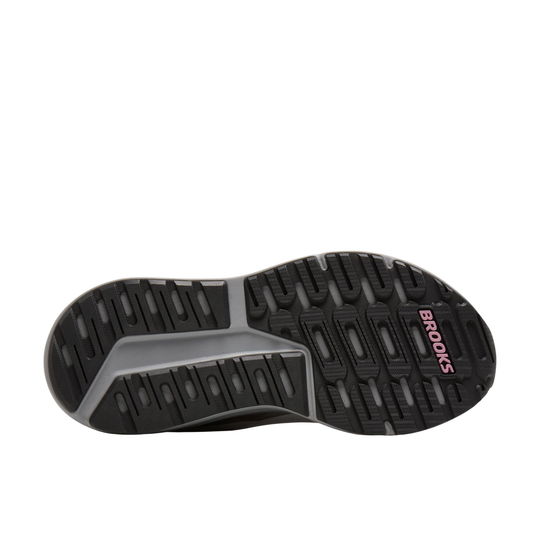 Black and gray running shoe outsole with pink Brooks branding