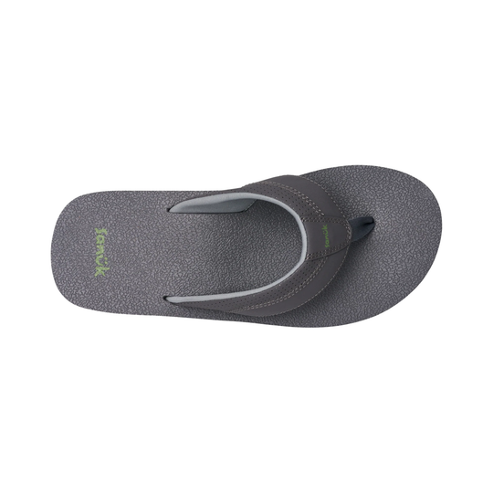 Gray sandal with a brand logo on a white background