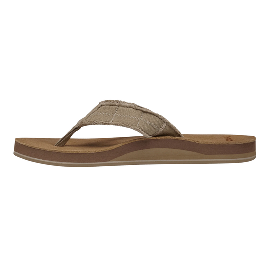 Brown sandal with braided strap on a white background