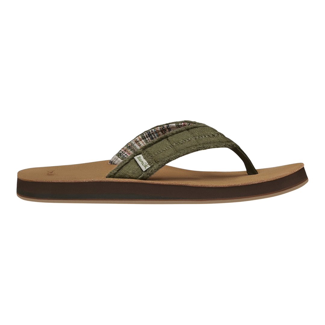 Green sandal with a brown sole on a white background