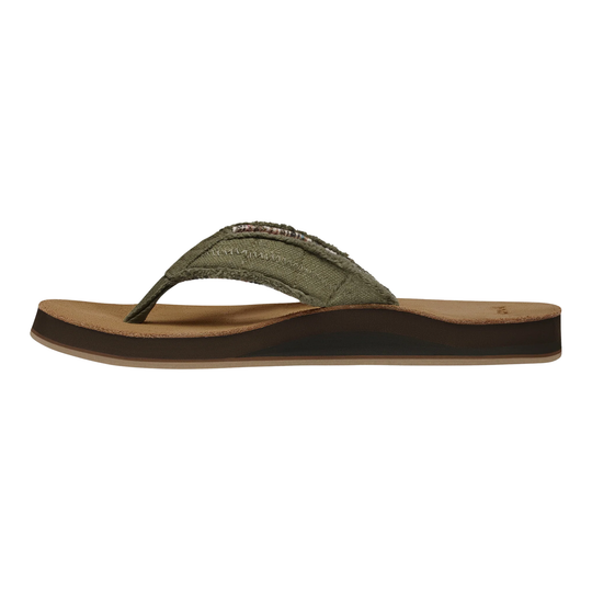 Green sandal with a brown sole on a white background