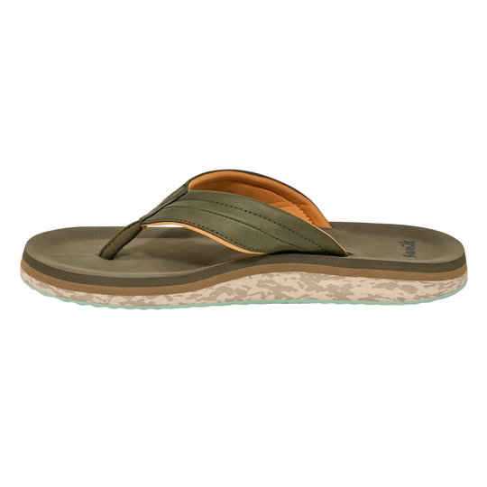 Green sandal with a patterned sole on a white background