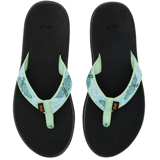 Black flip-flops with green straps on a white background