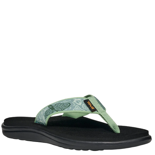 Green sandal with black sole on a white background
