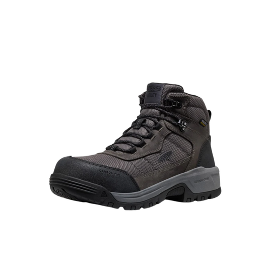 Black high-top work boot on a light gray background