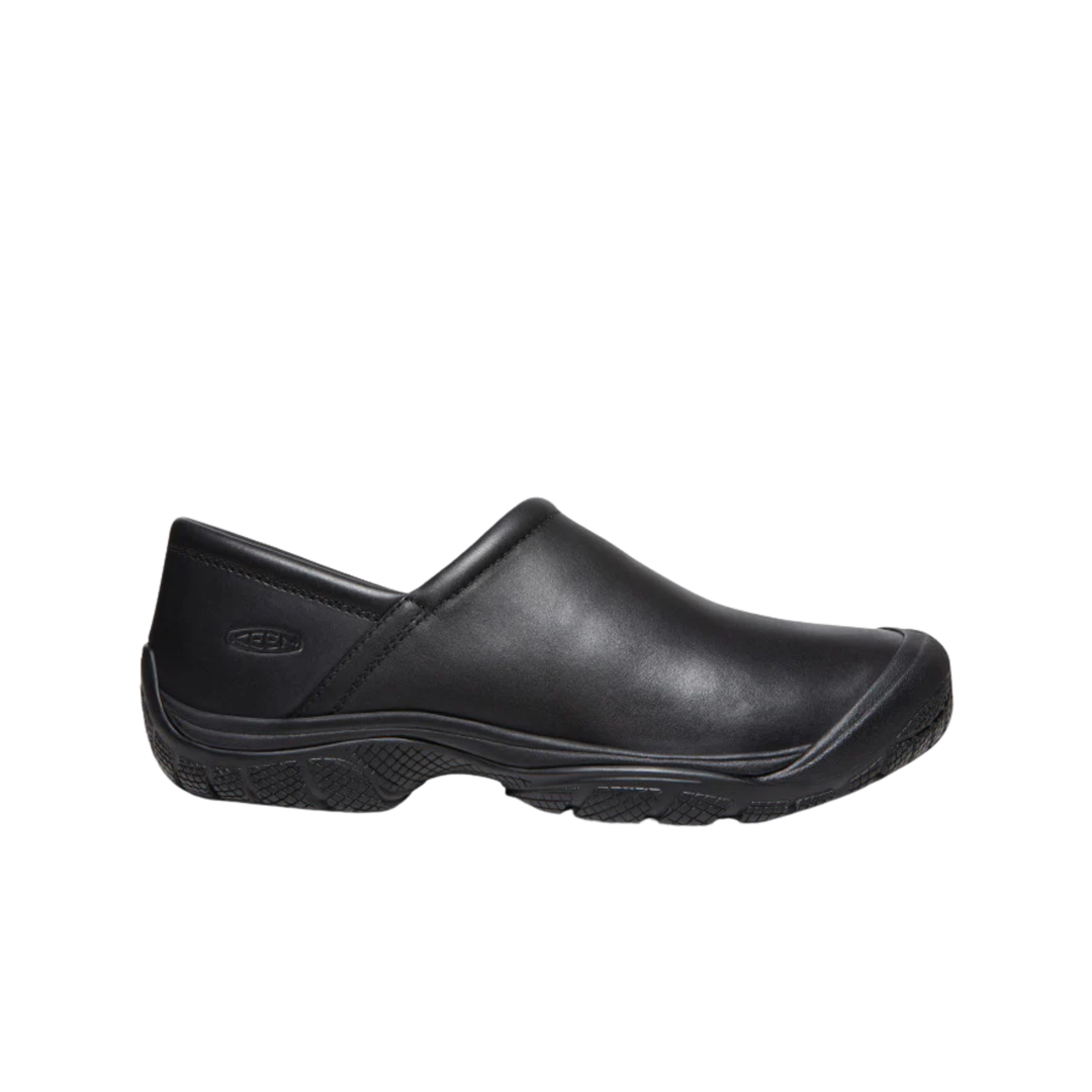 Black slip-on shoe on a white background