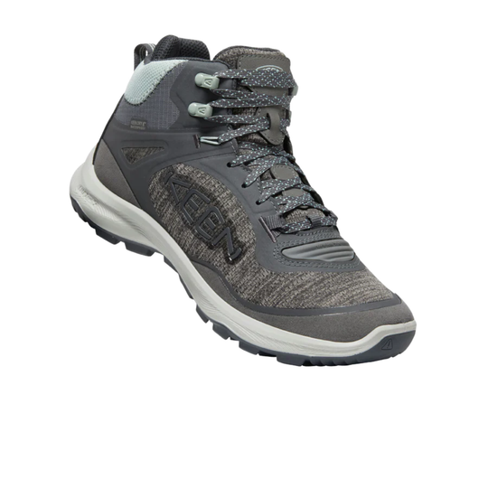 Gray hiking boot with KEEN logo on a white background