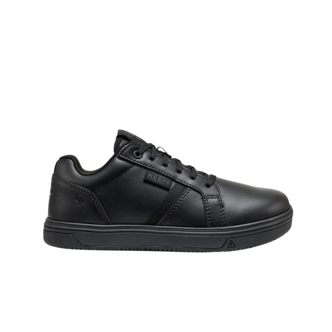 Black athletic work shoe on a white background