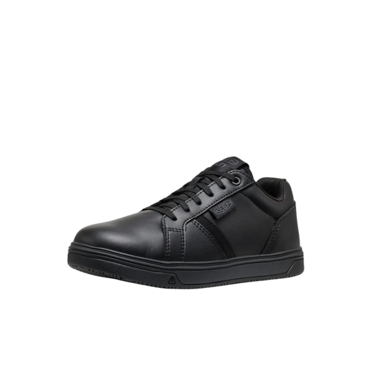 Black athletic work shoe on a white background