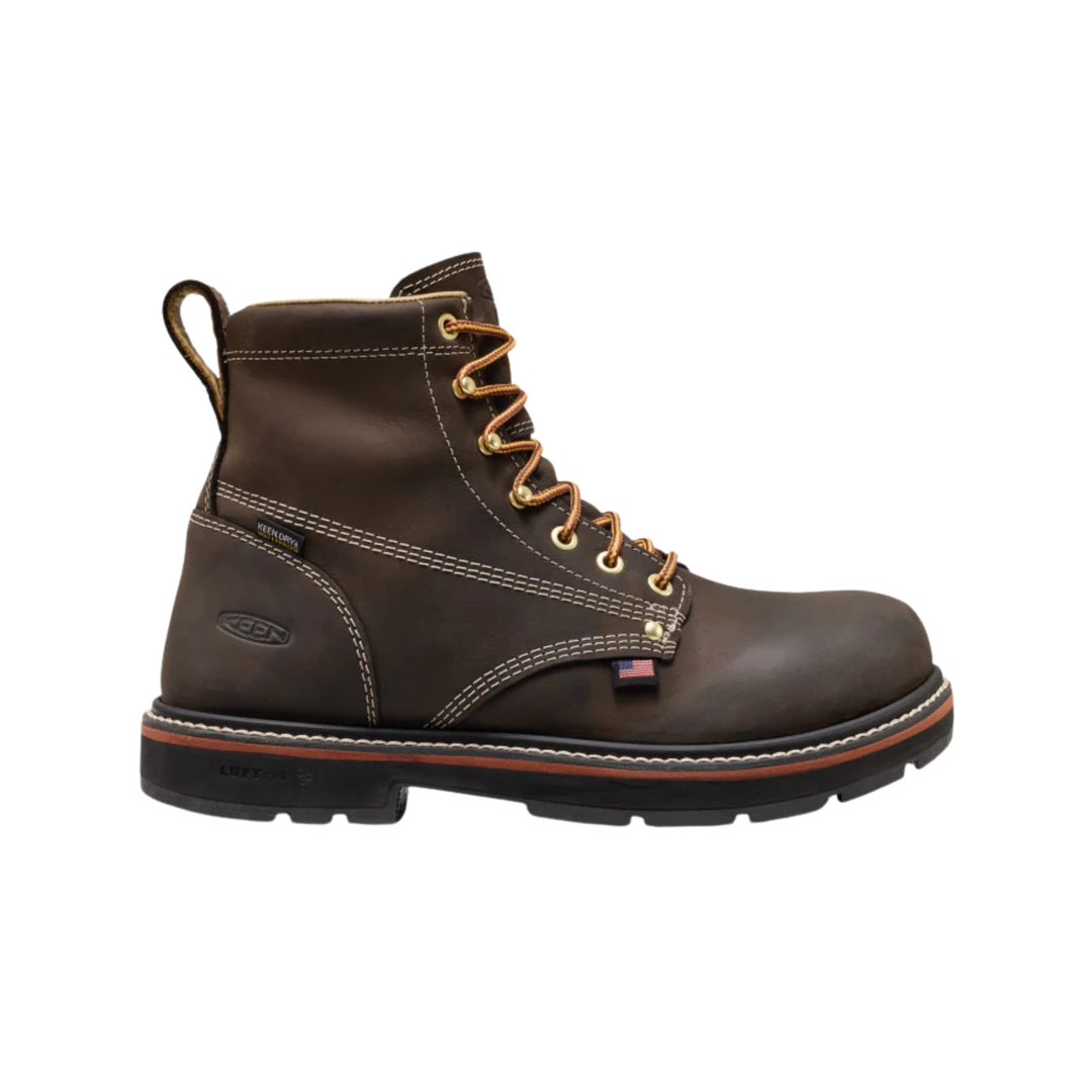 Brown leather boot with orange laces on a white background
