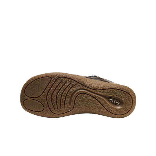 Brown sole of a shoe with 'Keen' branding on a white background