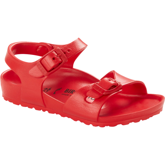 Red sandal with a buckle on a white background