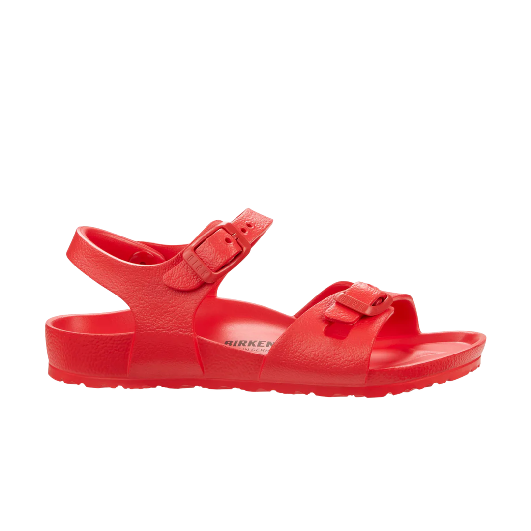 Red sandal with a strap on a white background
