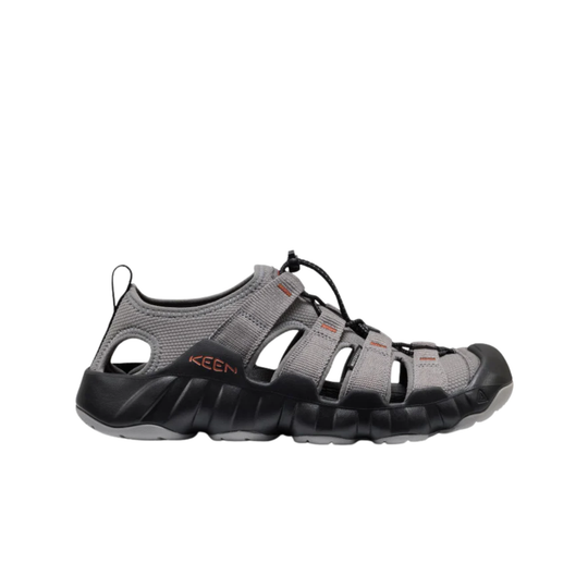 Grey sandal with black sole on a white background