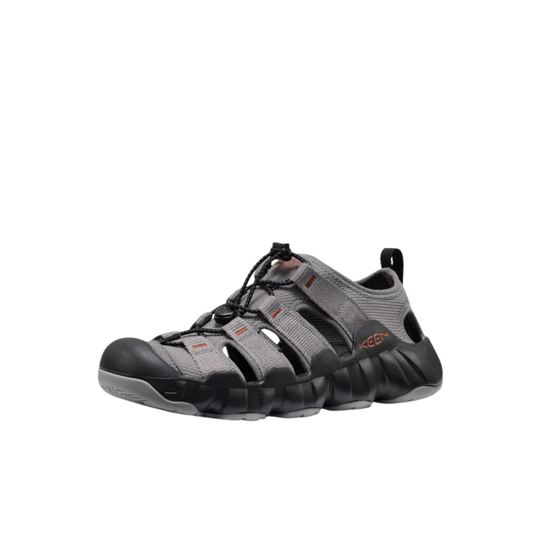 Grey sandal with black sole on a white background