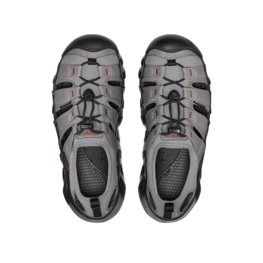 Pair of gray and black hiking sandals on a white background