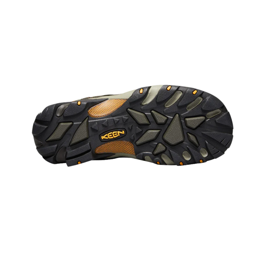 Black hiking shoe outsole with orange accents and KEEN logo