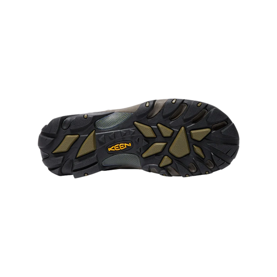 Black hiking boot outsole with olive traction inserts and KEEN logo