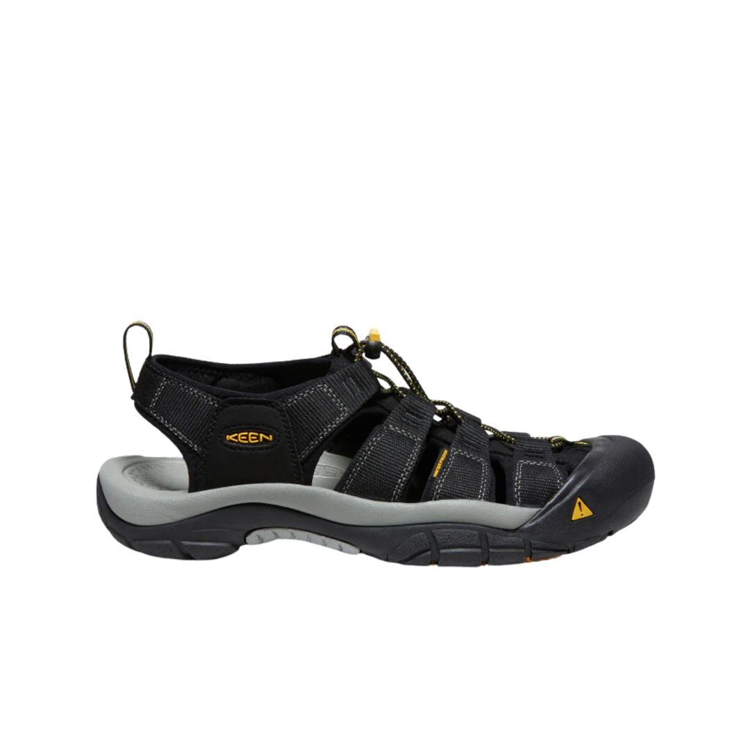 Black hiking sandal with gray sole on a white background