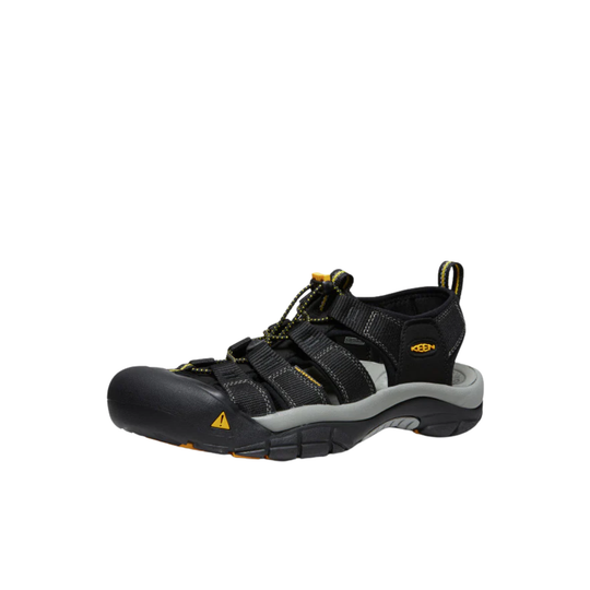 Black and yellow sandal with brand logo on a white background